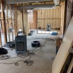 Construction site with exposed wooden framework.